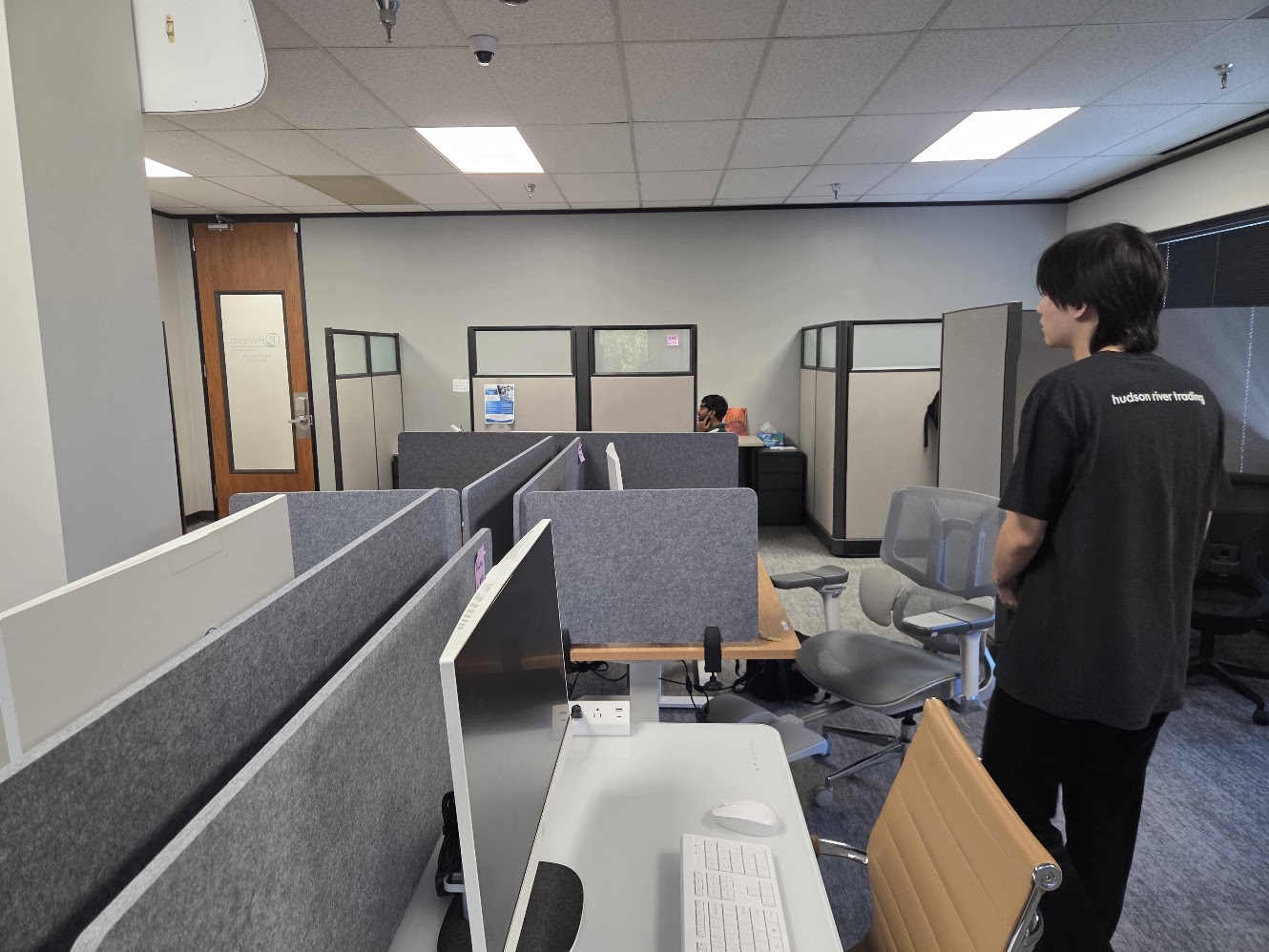 Feifan standing in the Pandesco office